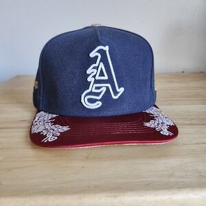 Navy Blue  and Red Snapback Cap with Embroidered Logo
